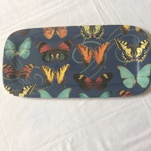 Appetizer plate with butterflies on it